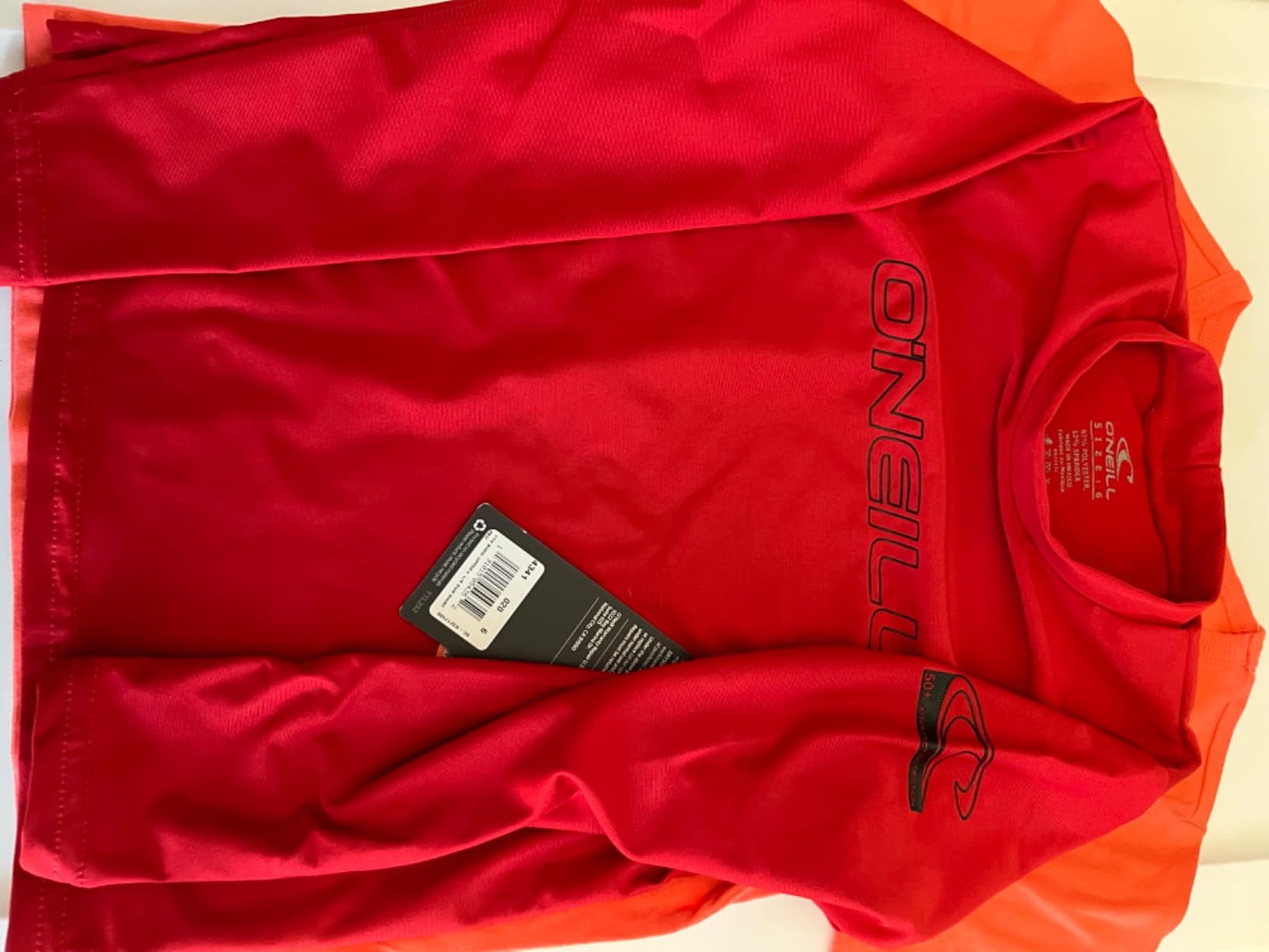 O'Neill Youth Basic Skins Long Sleeve Sun Shirt, UPF 50+ Rashguard, 4-Way Stretch Slim Fit for All Water Activities customer photo 2