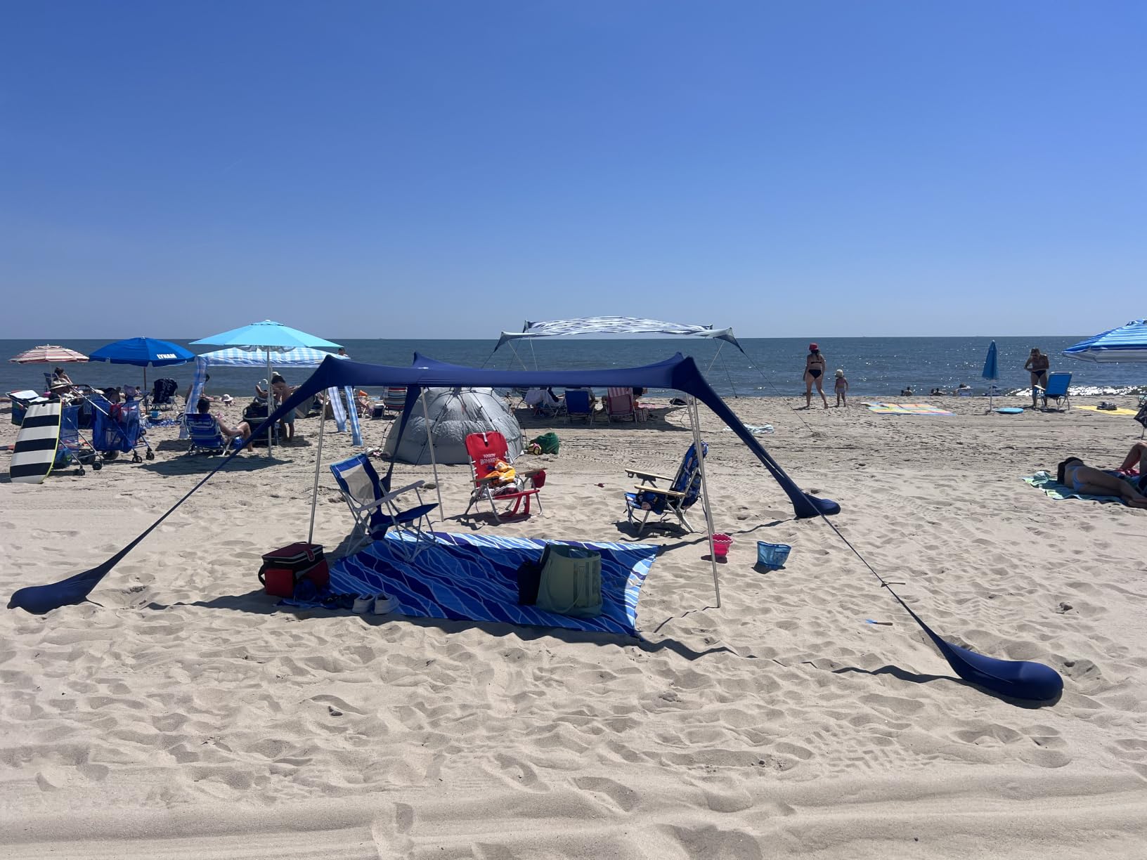 SUN NINJA Beach Tent Sun Shelter, Beach Shade Canopy with UPF50+ Protection | Beach Canopy Tent Sun Shade, Cabana Includes Carry Bag, Sand Shovel, Ground Pegs, 4 Poles & Anchor Bags customer photo 1