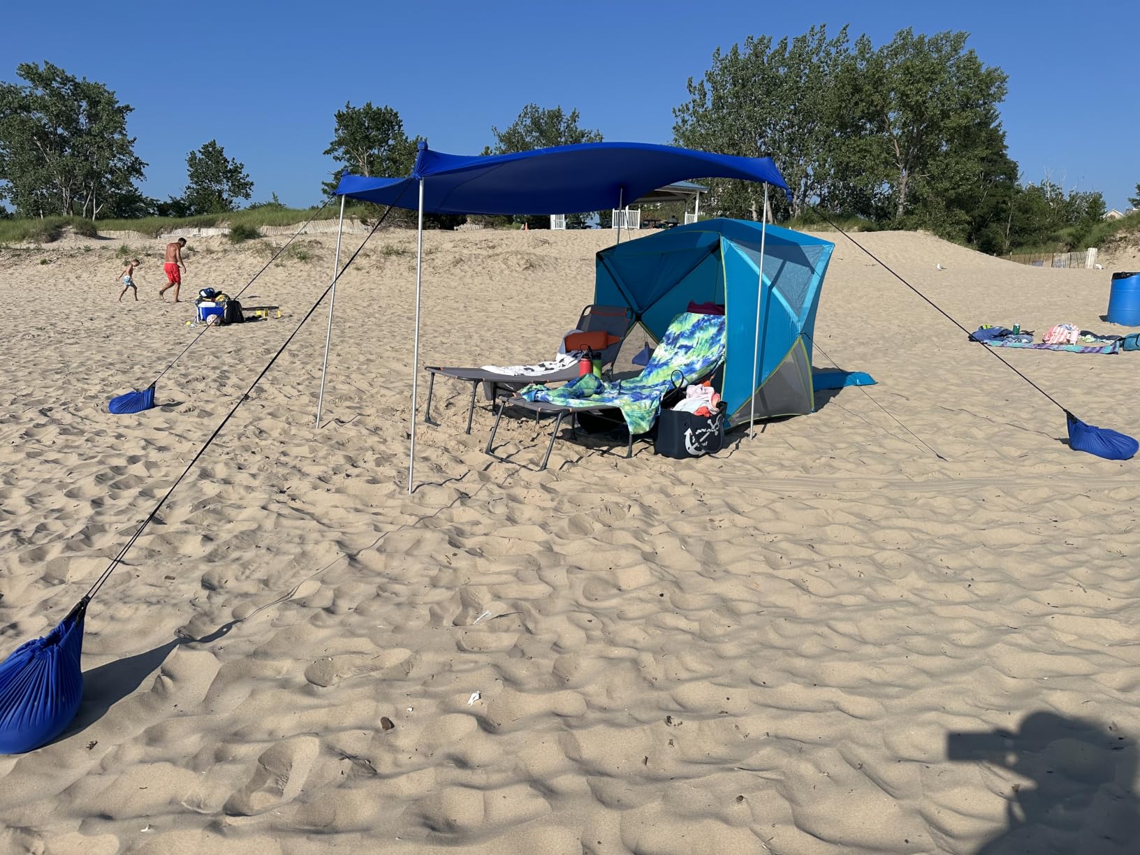 UMARDOO Family Beach Tent Canopy Sun Shade Portable 10×10FT, Large Wind Resistance Beach Sun Shelter Easy Setup with Packable Carry Bag for Outdoor Travel UPF 50+ (Blue) customer photo 2