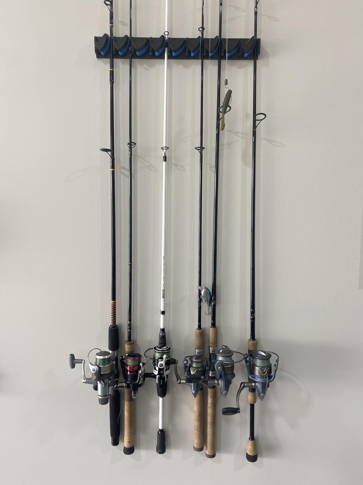 PLUSINNO Vertical Fishing Rod Holder, Wall Mounted Fishing Rod Rack, Fishing Pole Holder Holds Up to 9 Rods or Combos, Fishing Rod Holders for Garage, Fishing Gear and Gifts for Men customer photo 1