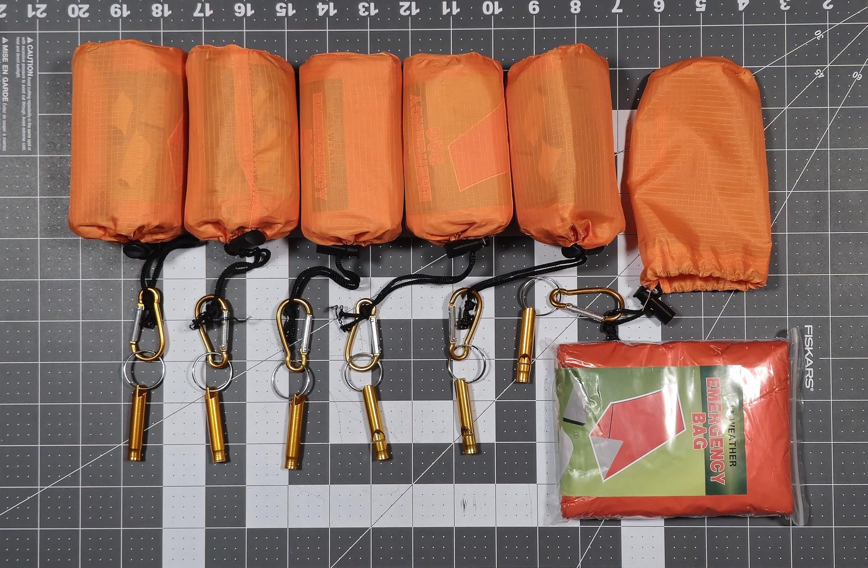 Emergency Sleeping Bag with Whistle, Portable Emergency Survival Bag, Lightweight Pocket Size Emergency Sleeping Bag, Waterproof Thermal Bivy Sack for Camping, Hiking customer photo 1