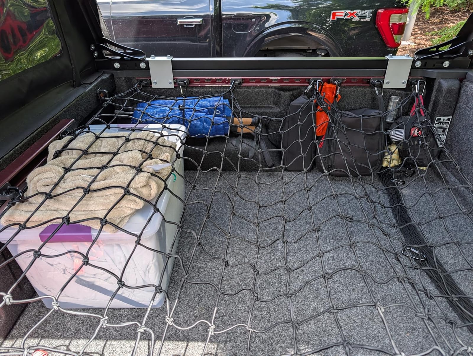 Truck Bed Cargo Net - 4 x 6 Foot, Heavy-Duty Elastic Mesh with 12 Black Clips and Storage Bag for Pickup for Cargo Netting, Securing Loads in Trailers, SUVs & Roof Racks customer photo 1