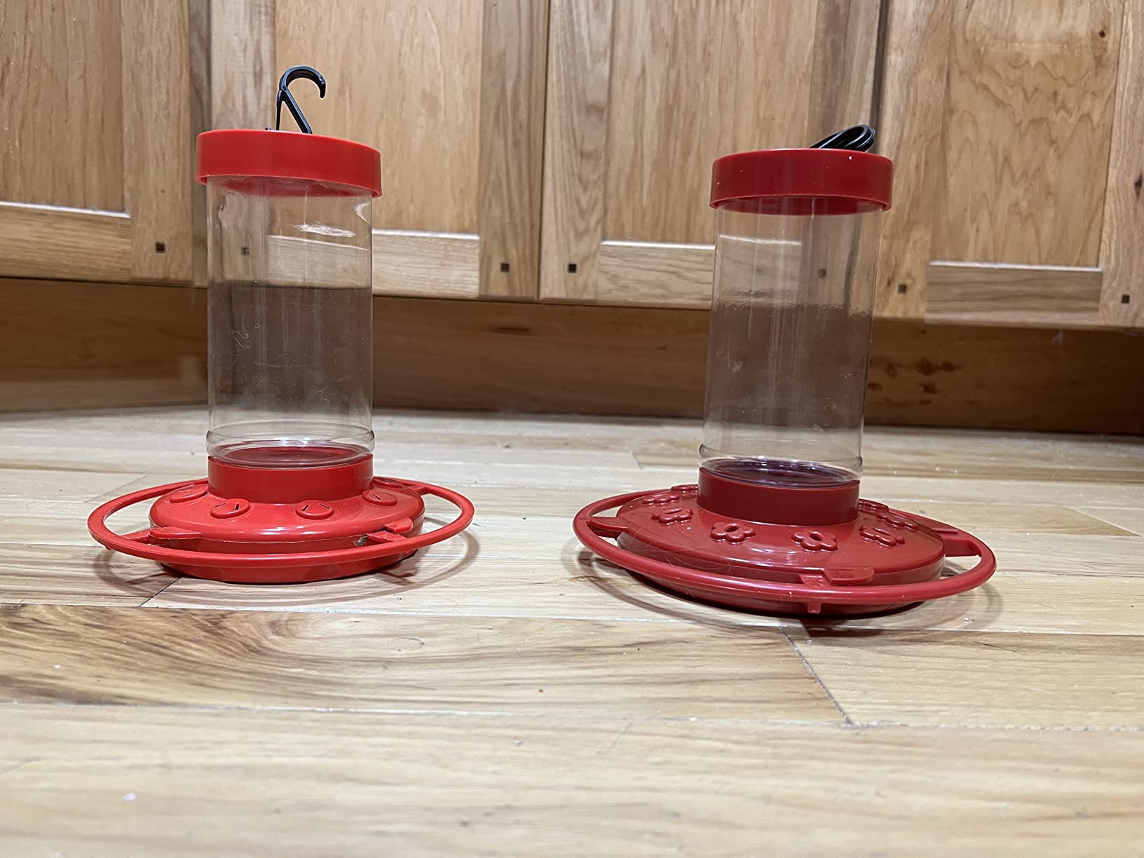 Hummingbird Feeder [Set of 2] Leakproof Clear Plastic 10 oz Wide Mouth. | Features A Built-in Ant Guard - Circular Perch with 5 Feeding Ports - Wide Mouth/2 Part Base for Easy Filling & Cleaning customer photo 1