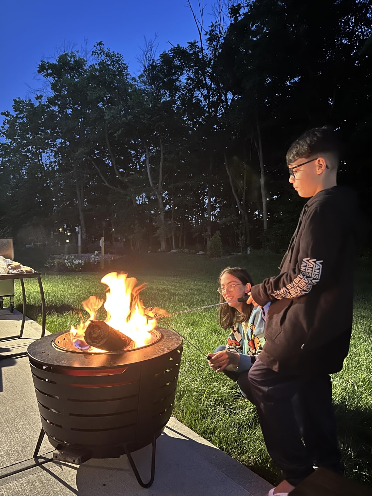 TIKI Patio Smokeless Outdoor Fire Pit, 25-Inch Wood-Burning Bonfire with Removable Ash Pan, Stand, and Weather-Resistant Cover customer photo 2