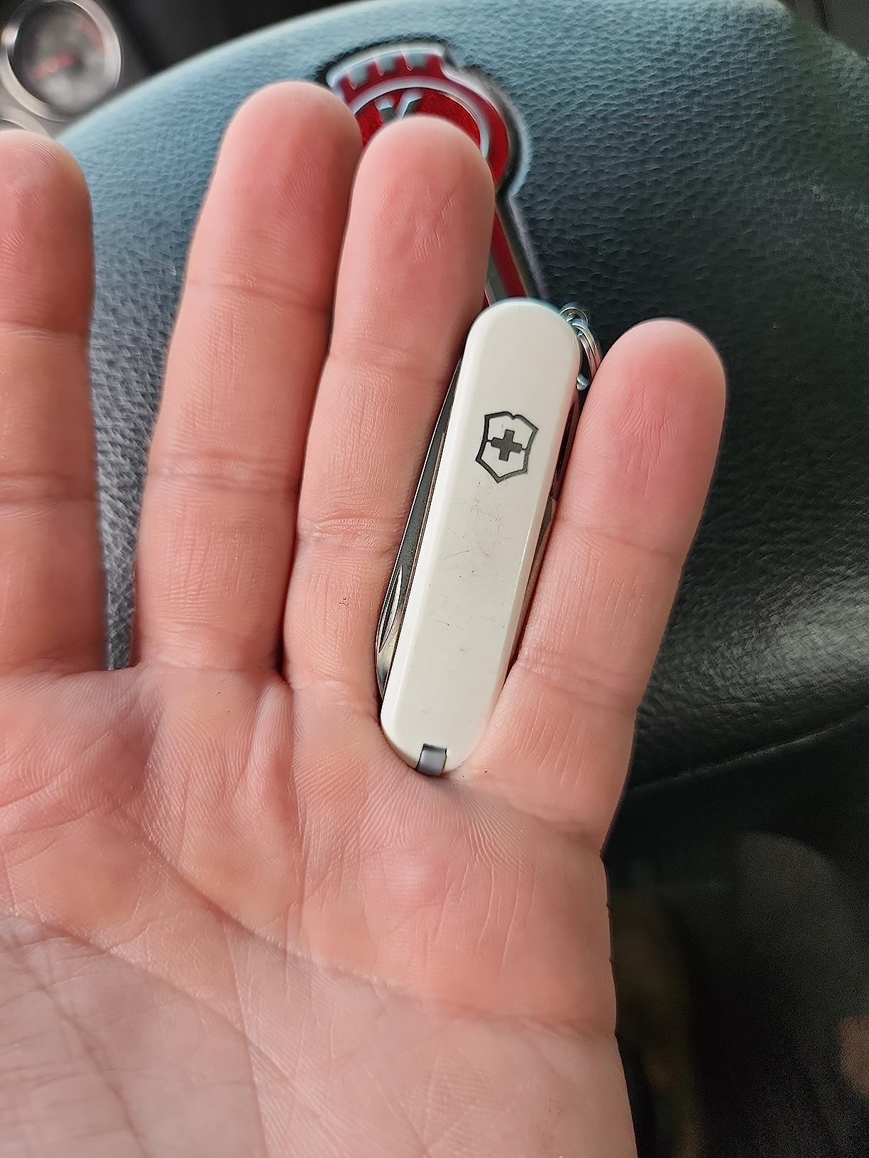 Victorinox Classic SD Swiss Army Knife, Compact, 7 Functions, Swiss Made Pocket Knife with Small Blade, Screwdriver and Key Ring - Style Icon (Red) | Swiss made compact multi-tool with scissors, nail file, tweezers, and toothpick. Durable iconic stainless steel construction customer photo 1