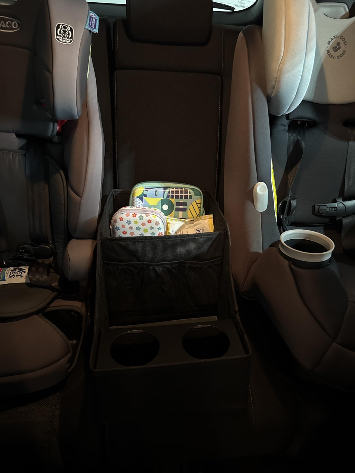 MULISOFT Car Backseat Organizer with 11 Compartments & 2 Cup Holders, Black | Made from durable Oxford fabric with a waterproof surface, anti-slip buckles, and a foldable design for easy storage. customer photo 1