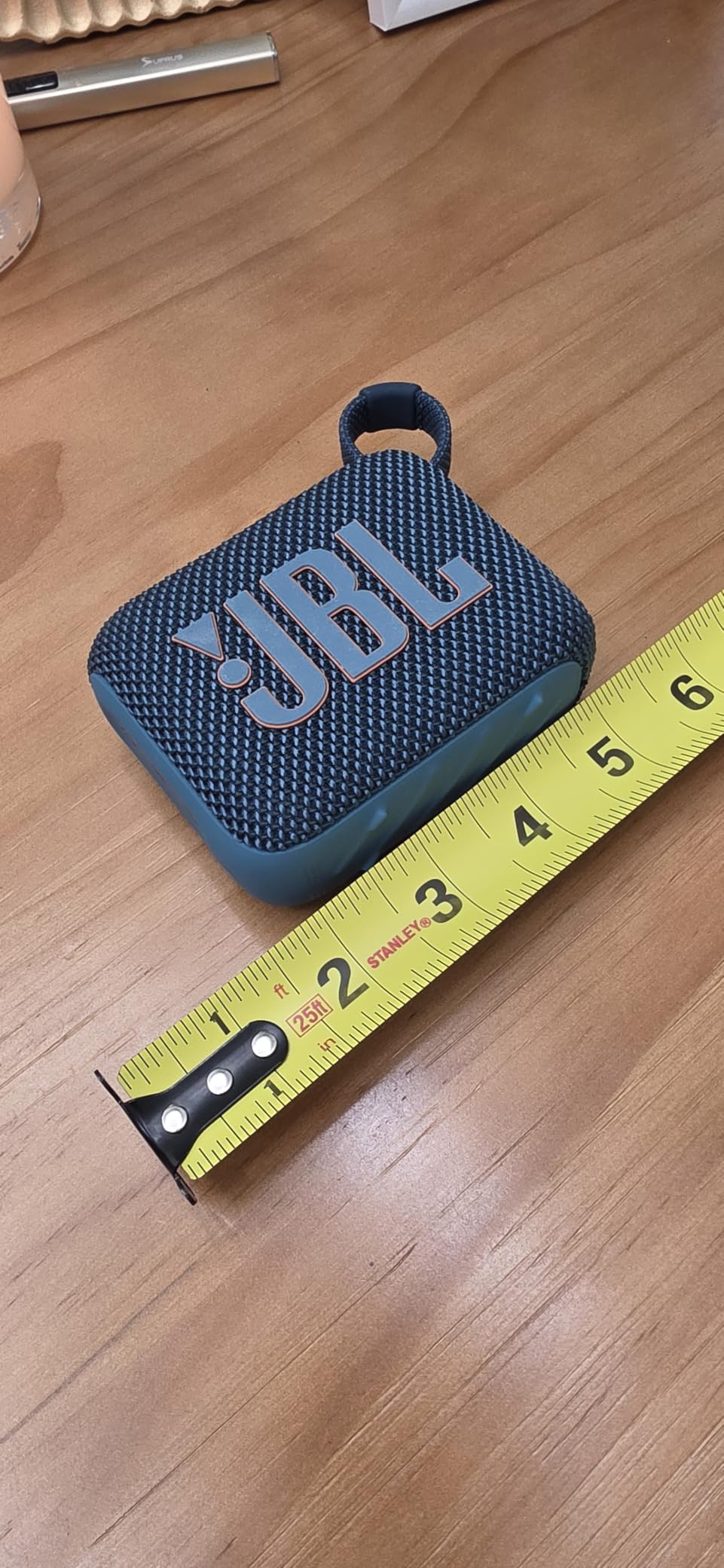 JBL Go 4 - Ultra-Portable, Waterproof and Dustproof Bluetooth Speaker, Big JBL Pro Sound with Punchy bass, 7-Hour Built-in Battery, Made in Part with Recycled Materials (Blue) customer photo 1