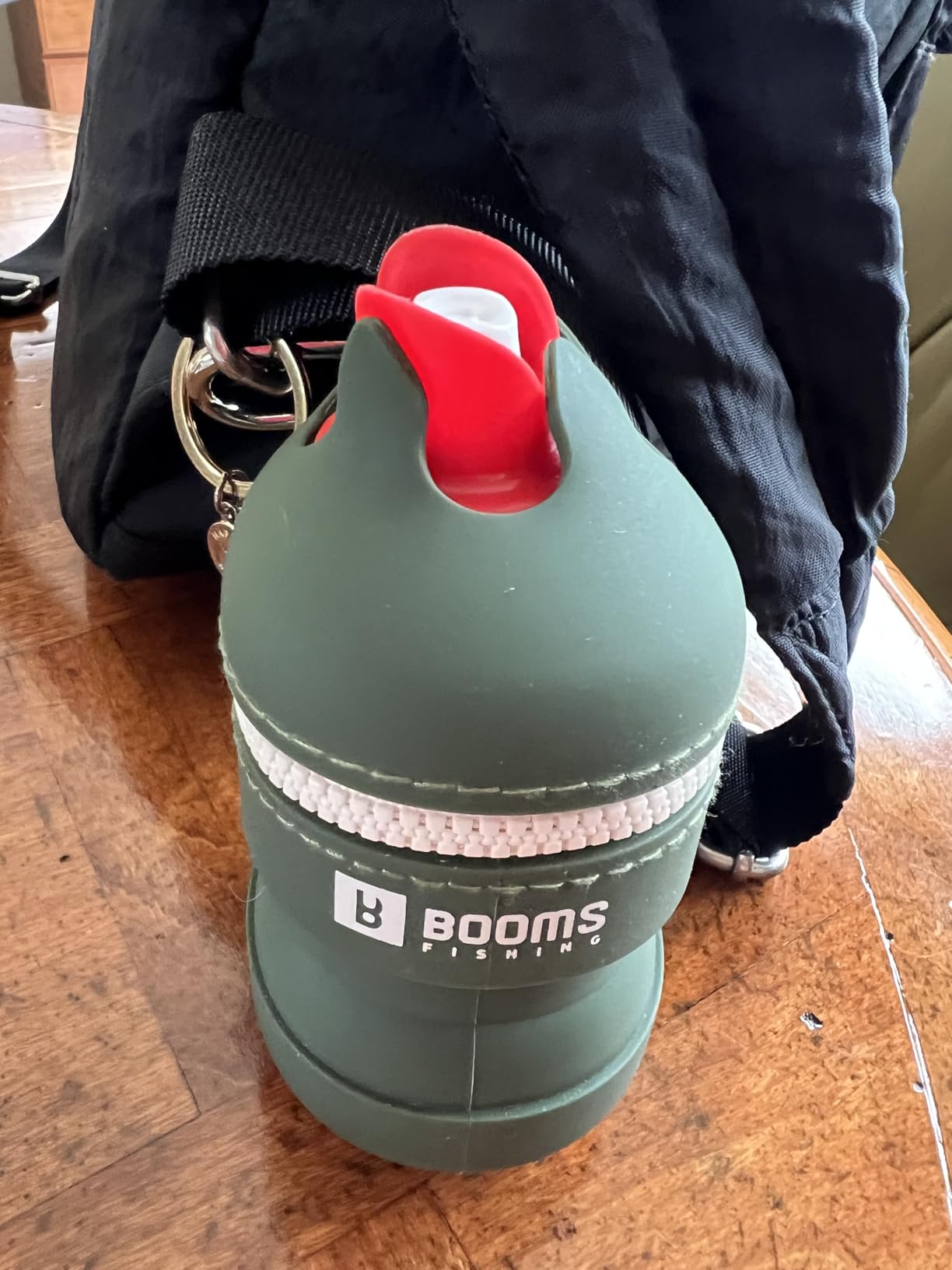Booms Fishing Portable Trash Pouch: Silicone Expandable & Collapsible Fishing Line Waste Cantainer - Eco-Friendly Reusable Garbage Holder for Fishing, Hiking, Camping & Outdoor Activities - ST2 Green customer photo 1