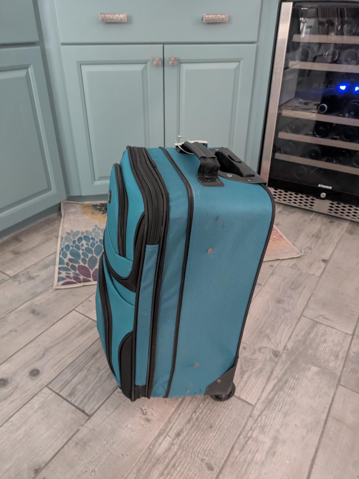 U.S. Traveler Rio Lightweight Softside Rolling Carry-on Suitcase, 2-Wheel Set, Orange customer photo 1