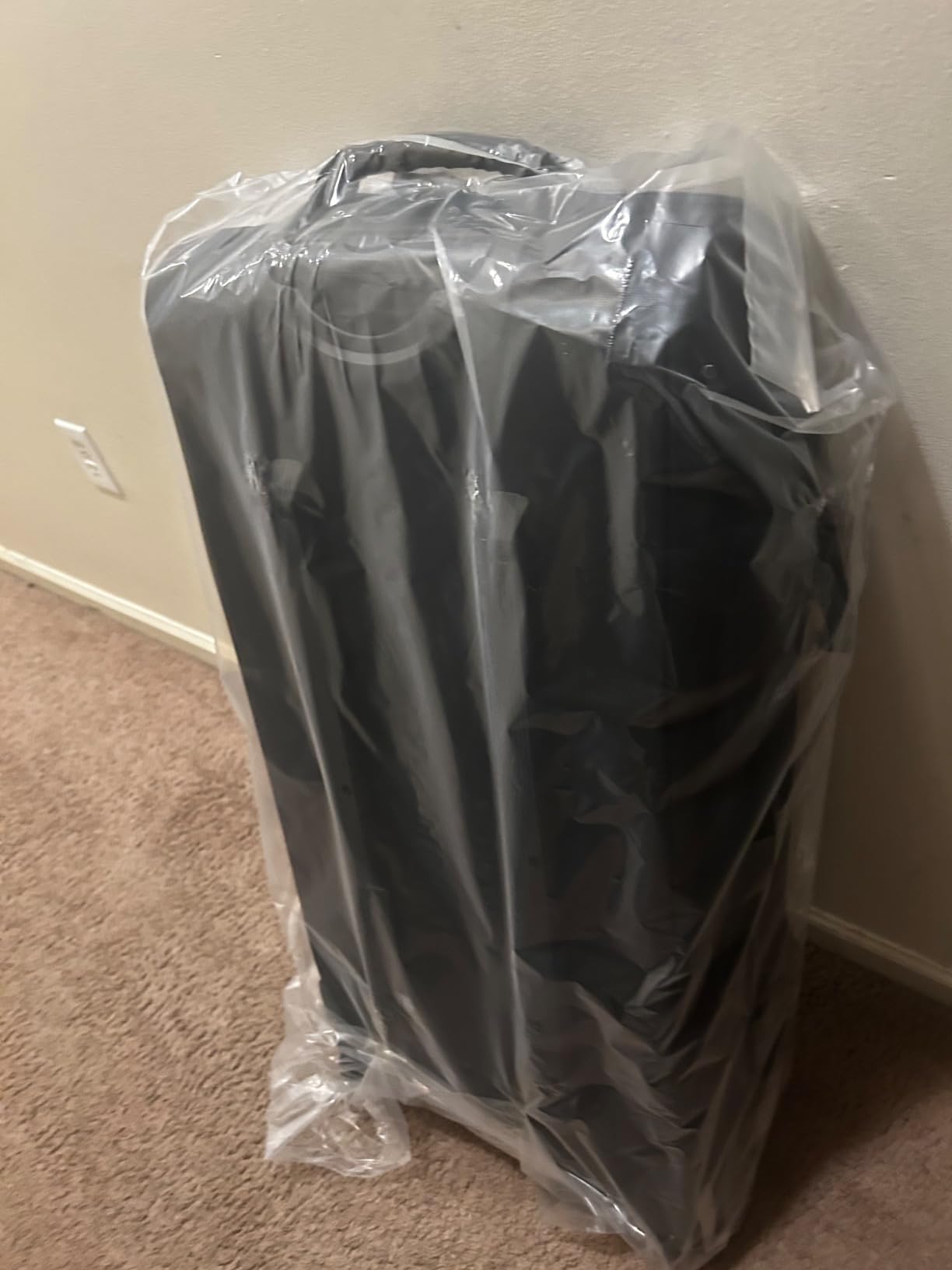 Amazon Basics 30-Inch Large Rolling Duffel Bag with Wheels and Handle, Durable Ripstop Polyester, 2 Layers of Space, Multiple Interior and Exterior Pockets, Black customer photo 1