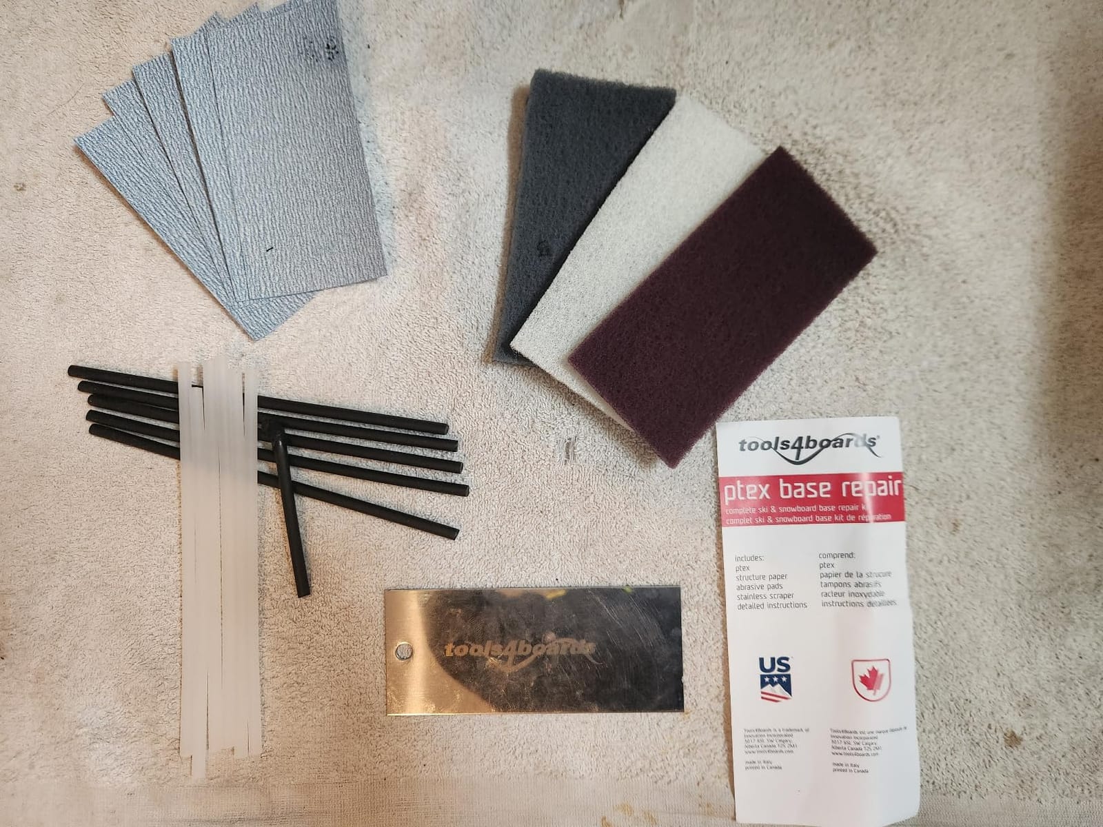 Tools4Boards Ski & Snowboard P-TEX Base Repair Kit: 12 pcs Ptex + 5 pcs Structure Sandpaper + 3 Brite Abrasive Pads + Stainless Scraper, Extra Large customer photo 1
