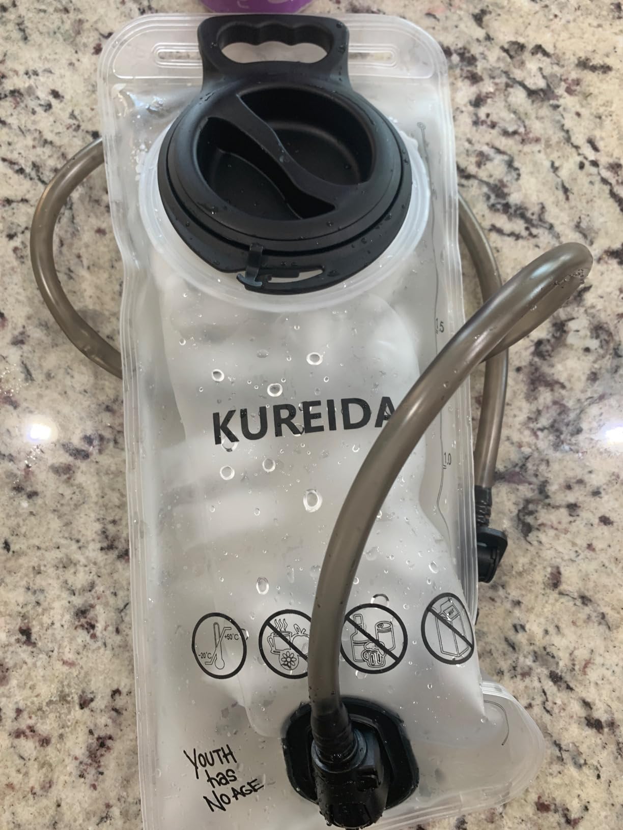 KUREIDA Hydration Bladder 2 Liter, BPA Free Water Bladder for Hiking Backpack Water Storage Bag with Insulated Tube, Hydration Backpack Replacement for Outdoor Camping Running Hiking customer photo 2