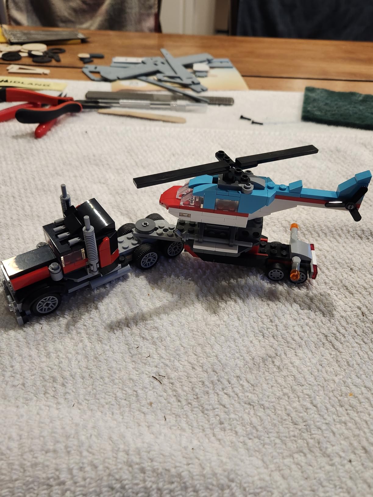 LEGO Creator 3 in 1 Flatbed Truck with Helicopter Toy, Transforms from Flatbed Truck Toy to Propeller Plane to Hot Rod and SUV Cars, Gift Idea for Boys and Girls Ages 7 Years Old and Up, 31146 customer photo 2